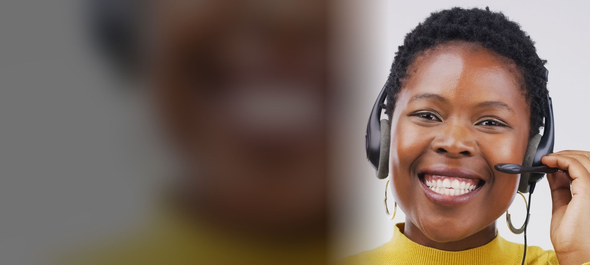 Smiling customer service agent wearing a headset
